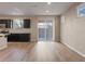 Kitchen with stainless steel appliances and a sliding glass door to the backyard at 6178 Pisan Ln, Las Vegas, NV 89148