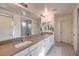 Elegant bathroom with double vanity, large mirror, and shower at 6403 Ava Ridge Ave, Las Vegas, NV 89141