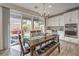 Kitchen dining area with backyard views and seating for six at 6403 Ava Ridge Ave, Las Vegas, NV 89141