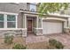 Inviting front entrance with stone accents and a double-door entry at 6403 Ava Ridge Ave, Las Vegas, NV 89141