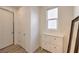 Bright hallway with linen closet and built-in storage at 6403 Ava Ridge Ave, Las Vegas, NV 89141