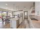 Spacious kitchen with an island, stainless steel appliances, and white cabinets at 6403 Ava Ridge Ave, Las Vegas, NV 89141