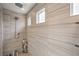 Modern shower with multiple shower heads and sleek tile at 6403 Ava Ridge Ave, Las Vegas, NV 89141