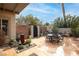 Outdoor patio area with seating and a water fountain at 6422 Hughes Springs Dr, Las Vegas, NV 89131