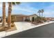 One-story house with desert landscaping and driveway at 6422 Hughes Springs Dr, Las Vegas, NV 89131