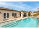 Escape to your own backyard with this large pool and spa at 6422 Hughes Springs Dr, Las Vegas, NV 89131