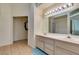 Double vanity bathroom with a separate shower and tile flooring at 6860 Coral Rock Dr, Las Vegas, NV 89108