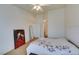 Bedroom with ceiling fan and large mirror at 6860 Coral Rock Dr, Las Vegas, NV 89108