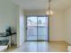 Dining area with sliding door leading to a private patio at 6860 Coral Rock Dr, Las Vegas, NV 89108