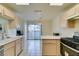 Kitchen features stainless steel appliances and light wood cabinets at 6860 Coral Rock Dr, Las Vegas, NV 89108