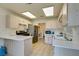 Efficient kitchen with stainless steel appliances and island at 6860 Coral Rock Dr, Las Vegas, NV 89108