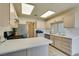 Clean kitchen featuring updated appliances and cabinetry at 6860 Coral Rock Dr, Las Vegas, NV 89108