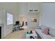 Spacious living room with high ceilings and a view of the kitchen at 6860 Coral Rock Dr, Las Vegas, NV 89108