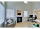 Living room with fireplace, hardwood floors and comfortable seating at 6860 Coral Rock Dr, Las Vegas, NV 89108