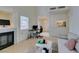 Light-filled living room features a fireplace and plenty of natural light at 6860 Coral Rock Dr, Las Vegas, NV 89108