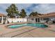 Community pool with surrounding patio and gazebo at 6860 Coral Rock Dr, Las Vegas, NV 89108