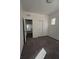 Bright bedroom featuring a double door closet and carpet flooring at 690 Calamus Palm Pl, Henderson, NV 89011