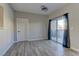 Bright and airy living room with sliding glass door leading to a patio at 6955 N Durango Dr # 1048, Las Vegas, NV 89149