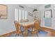 Bright dining room with wooden table and chairs at 700 Capri Dr # 34C, Boulder City, NV 89005