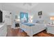 Main bedroom with wood flooring, a fireplace, and access to the bathroom at 700 Capri Dr # 34C, Boulder City, NV 89005