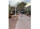 Brick pathway with arches in a community setting at 7129 Flora Lam St, Las Vegas, NV 89166