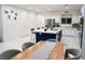 Modern kitchen with large island and white cabinets at 7129 Flora Lam St, Las Vegas, NV 89166