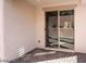 Covered patio with sliding glass door access from inside at 7129 Flora Lam St, Las Vegas, NV 89166