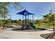 Playground with play structures and shade structure at 7129 Flora Lam St, Las Vegas, NV 89166