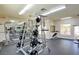 Well-equipped gym with weight machines and mirrors at 7173 S Durango Dr # 212, Las Vegas, NV 89113