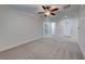 Bright bedroom with ceiling fan and carpet flooring at 7683 Jasmine Falls Dr, Las Vegas, NV 89179