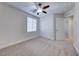 Spacious bedroom with double door closet and window at 7683 Jasmine Falls Dr, Las Vegas, NV 89179