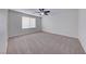 Bright bedroom featuring a ceiling fan and window coverings at 7683 Jasmine Falls Dr, Las Vegas, NV 89179