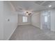 Spacious bedroom with ceiling fan and carpet flooring at 7683 Jasmine Falls Dr, Las Vegas, NV 89179