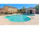 Inviting community pool with spa and surrounding patio area at 7683 Jasmine Falls Dr, Las Vegas, NV 89179