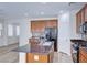 Kitchen island with granite countertops and double sink at 7683 Jasmine Falls Dr, Las Vegas, NV 89179