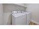 Laundry room with washer and dryer, and shelving at 7683 Jasmine Falls Dr, Las Vegas, NV 89179