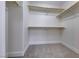 Large walk-in closet with ample shelving at 7683 Jasmine Falls Dr, Las Vegas, NV 89179