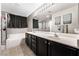 Bathroom with double vanity and soaking tub at 7879 Narnia Ave, Las Vegas, NV 89113