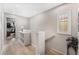 Upstairs hallway with built-in shelving and access to bedrooms at 7879 Narnia Ave, Las Vegas, NV 89113