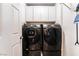 Convenient laundry room with stacked washer and dryer at 7879 Narnia Ave, Las Vegas, NV 89113