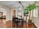 Bright breakfast nook with a table for four and hardwood floors at 7976 Sleeping Lily Dr, Las Vegas, NV 89178