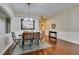 Hardwood floors, modern chandelier, and view of the entry way at 7976 Sleeping Lily Dr, Las Vegas, NV 89178