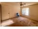 Bedroom featuring neutral walls, carpet, window with blinds, and a ceiling fan at 8070 W Russell Rd # 2068, Las Vegas, NV 89113