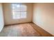 Bedroom featuring neutral walls, carpet, and a window with blinds at 8070 W Russell Rd # 2068, Las Vegas, NV 89113