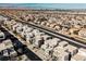 Aerial view of a row of modern homes and surrounding neighborhood at 816 Loch Katrine Ave, Henderson, NV 89012