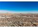 Aerial view of a residential area near mountains and desert at 816 Loch Katrine Ave, Henderson, NV 89012