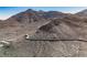 Aerial view of a winding road on a rocky mountainside at 816 Loch Katrine Ave, Henderson, NV 89012