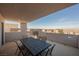 Covered balcony with patio furniture and city views at 816 Loch Katrine Ave, Henderson, NV 89012