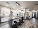 Modern kitchen with island and stainless steel appliances at 816 Loch Katrine Ave, Henderson, NV 89012