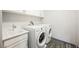 Laundry room with washer, dryer, and utility sink at 816 Loch Katrine Ave, Henderson, NV 89012